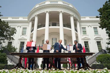 President Donald Trump, center, with from left, Bahrain Foreign Minister Khalid bin Ahmed Al Khalifa, Israeli Prime Minister Benjamin Netanyahu, and UAE Foreign Minister Abdullah bin Zayed al-Nahyan on the South Lawn of the White House, Tuesday, Sept. 15, 2020, in Washington. (AP)