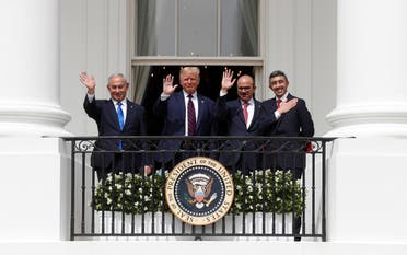 Israel's PM Benjamin Netanyahu, US President Donald Trump, Bahrain’s FM Abdullatif Al Zayani and UAE FM Sheikh Abdullah bin Zayed Al Nahyan wave from the White House balcony, Sept. 15, 2020. (Reuters)