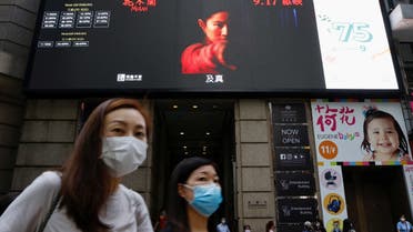A screen showing a trailer of Walt Disney's live-action war movie Mulan is pictured at a cinema in Hong Kong, China, on September 17, 2020. (Reuters)