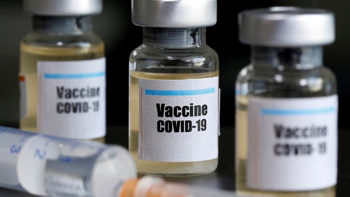 Small bottles labeled with a Vaccine COVID-19 sticker and a medical syringe are seen in this illustration taken April 10, 2020. (Reuters)