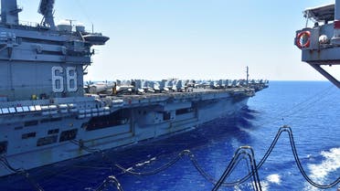 USS Nimitz receives fuel from the Henry J. Kaiser-class fleet replenishment oiler USNS Tippecanoe during an underway replenishment in the South China Sea, July 7, 2020. (Reuters)