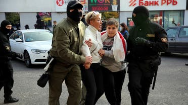 Law enforcement officers detain women during a rally to protest against the Belarus presidential election results in Minsk on September 19, 2020. (AFP)