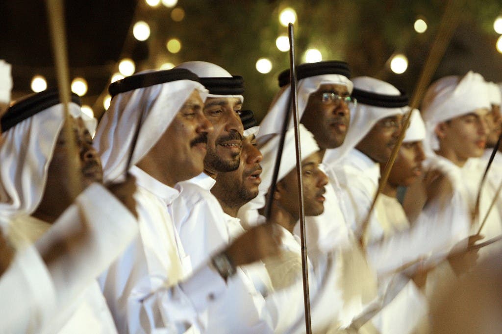 Emirati men dance during a mass wedding ceremony in the emirate of Umm al-Qaiwain on June 14, 2009. (File photo: AFP)