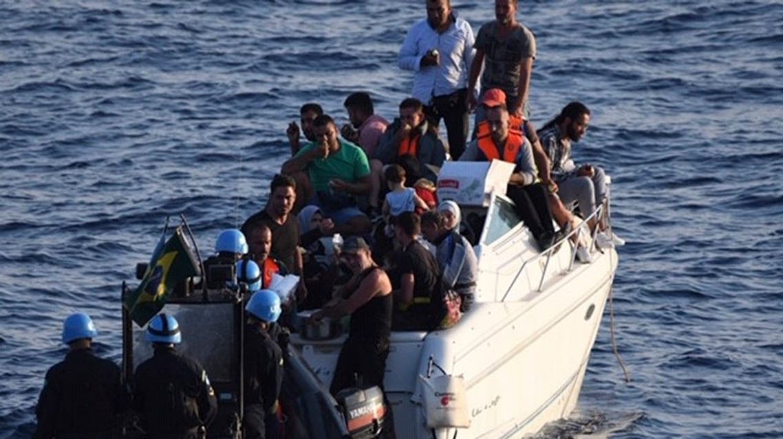 A boat overcrowded with migrants in the Mediterranean Sea. The UN peacekeeping force in Lebanon says the migrants were trying to reach the Mediterranean island of Cyprus. (File photo: AP)