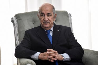 Algerian President Abdelmadjid Tebboune meets with the visiting French Foreign Minister (unseen) in the capital Algiers on January 21, 2020. (AFP)