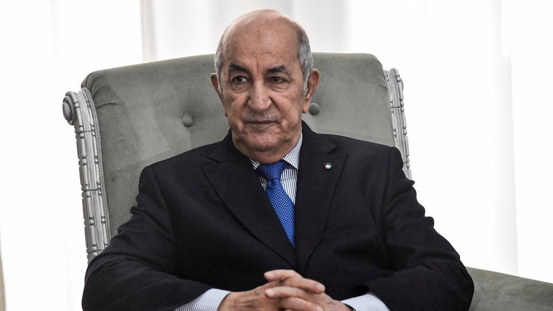 Algerian President Abdelmadjid Tebboune meets with the visiting French Foreign Minister (unseen) in the capital Algiers on January 21, 2020. (AFP)