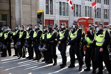 مظاهرات ضد الإغلاق في بريطانيا - يوم أمس ( رويترز)