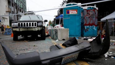 A car with several broken windows and a broken bumper sits at the CHOP (Capitol Hill Organized Protest) n Seattle, Washington, June 29, 2020. (Reuters)