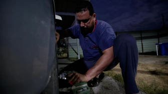 Visually impaired Iraqi uses touch and sound to fix cars
