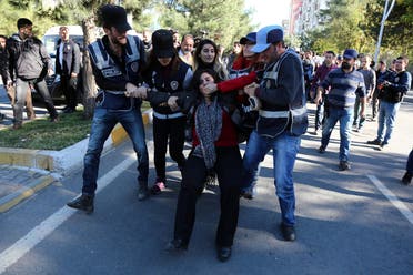 Police detain Sebahat Tuncel, co-chair of the pro-Kurdish Democratic Regions Party (DBP), during a protest against the arrest of Kurdish lawmakers, in the southeastern city of Diyarbakir, Turkey, November 4, 2016. (File photo: Reuters)