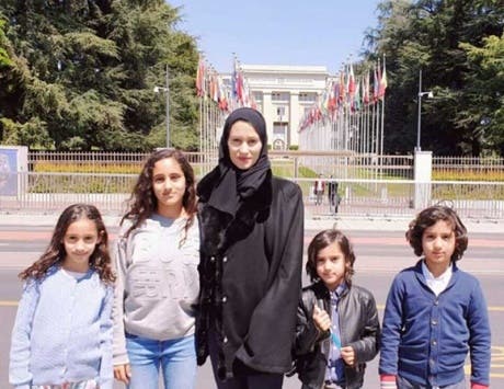 Sheikh Talal Al Thani's wife and children.