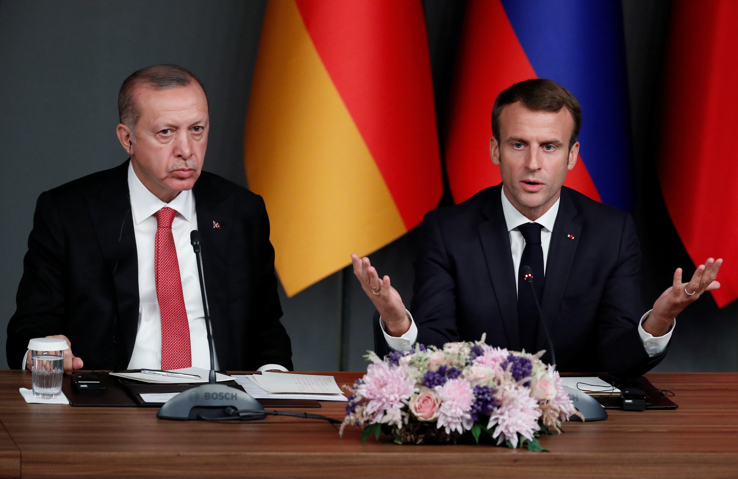 Turkish President Tayyip Erdogan and French President Emmanuel Macron attend a news conference during the Syria summit in Istanbul, Turkey, October 27, 2018. (Reuters)