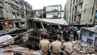 India building collapse toll climbs to 35, as rain hampers search and rescue efforts