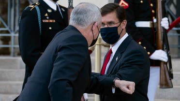Secretary of Defense Mark Esper, right, greets Israeli Defense Minister Benny Gantz at the Pentagon, Sept. 22, 2020. (AP)