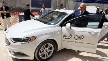 Israeli Prime Minister Benjamin Netanyahu gets into an autonomous vehicle during a cornerstone-laying ceremony for Mobileye's center in Jerusalem August 27, 2019. (Abir Sultan/Pool via Reuters)