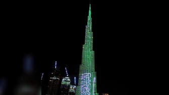 Dubai’s Burj Khalifa lights up in green, white to mark 90th Saudi National Day