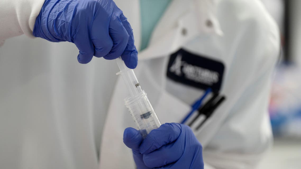  A scientist conducts research on a vaccine for the novel coronavirus (COVID-19) at the laboratories of RNA medicines company Arcturus Therapeutics in San Diego, California. (Reuters)