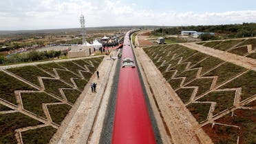 An aerial view shows a train on the Standard Gauge Railway (SGR) line constructed by the China Road and Bridge Corporation (CRBC) and financed by Chinese government in Kimuka, Kenya October 16, 2019. REUTERS