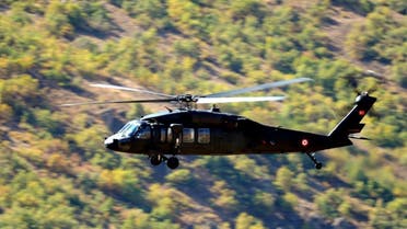 Turkey forces  threw 2 person form Helicopter
