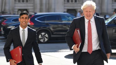 Britain's Chancellor of the Exchequer Rishi Sunak and Prime Minister Boris Johnson arrive to attend a Cabinet meeting at the Foreign and Commonwealth Office (FCO) in London, Britain. (Reuters)