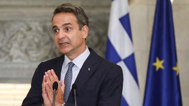 Greek Prime Minister Kyriakos Mitsotakis gestures during a news conference. (Reuters)