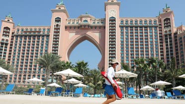 A beach lifeguard is seen at the Atlantis The Palm hotel, as the Emirates reopen to tourism amid coronavirus disease (COVID-19), in Dubai, United Arab Emirates July 7, 2020. (Reuters)