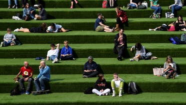 People are seen relaxing in an outdoor seating area, whilst the reproduction R number of COVID-19 infections in the United Kingdom has risen and may be above 1, London, Britain. (Reuters)