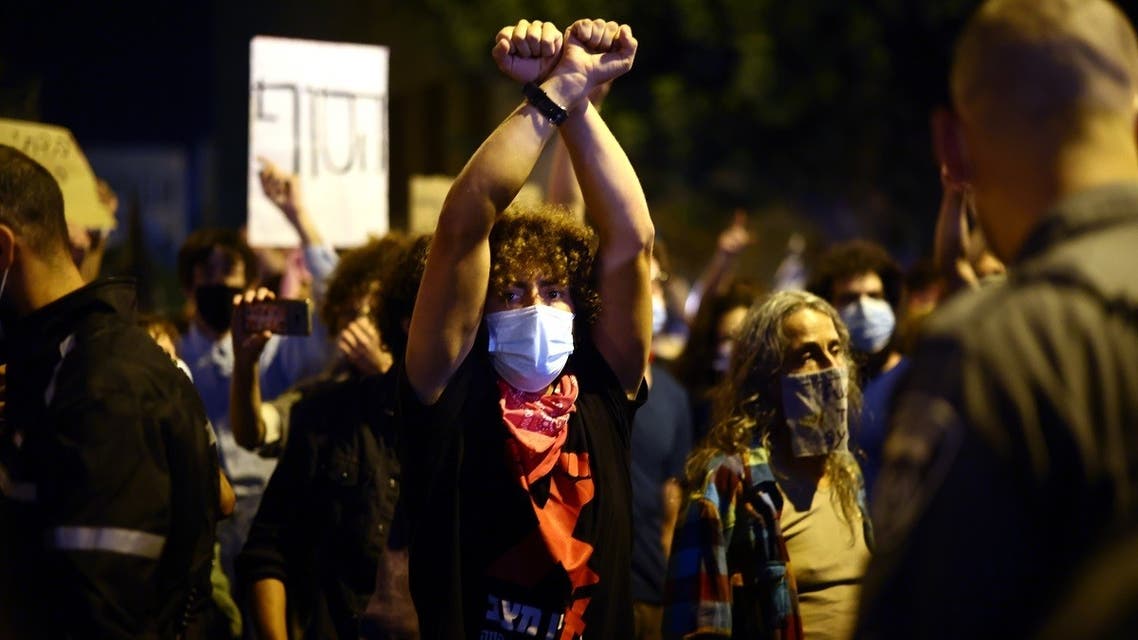 Israeli protesters gather during a demonstration amid a second lockdown in front of PM Netanyahu's residence in Jerusalem, on September 26, 2020. (AFP)