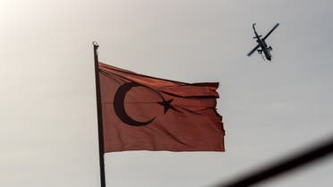 العلم التركي ومروحية تركية- أرشيفية