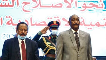 (L to R) Sudan's Prime Minister Abdalla Hamdok and Sovereign Council chief General Abdel Fattah al-Burhan attend the opening session of the First National Economic Conference in the capital Khartoum on September 26, 2020. (AFP)