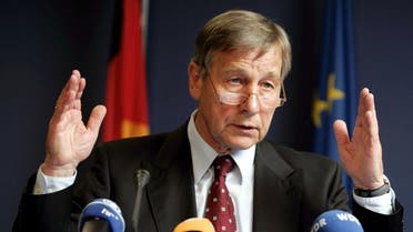 In this file photo taken on July 26, 2004 Wolfgang Clement, then German Economy and Labor Minister, gives a press conference at the EU headquarters in Brussels. (AFP)