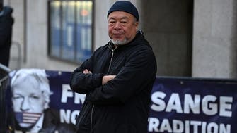Dissident Chinese artist Weiwei supports Assange with silent protest in London