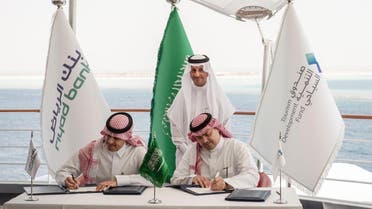 Representatives from Saudi Tourism Development Fund and Riyadh Bank sign a deal in the presence of Saudi Arabia’s Tourism minister Ahmed al Khateeb. (Twitter/@RiyadBank)