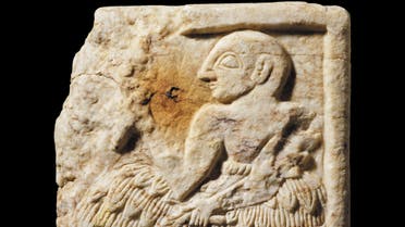 A handout picture released by the British Museum in London on September 28, 2020 shows a Sumerian plaque, dating to around 2400BC, and belonging to the Early Dynastic III period of southern Iraq, that was smuggled out of Iraq and then seized from an online auction site by the UK authorities. (File photo: AFP)