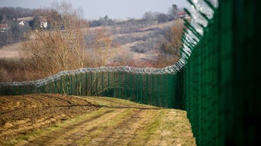 A barbed wire fence is set up along the Slovenian-Croatian border in Rakovec, in Slovenia on February 16, 2017. (AFP)