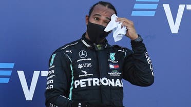 Third placed Mercedes’ Lewis Hamilton on the podium after the race at the Russian Grand Prix , held at Sochi Autodrom, Russia,  on September 27, 2020. (Reuters)