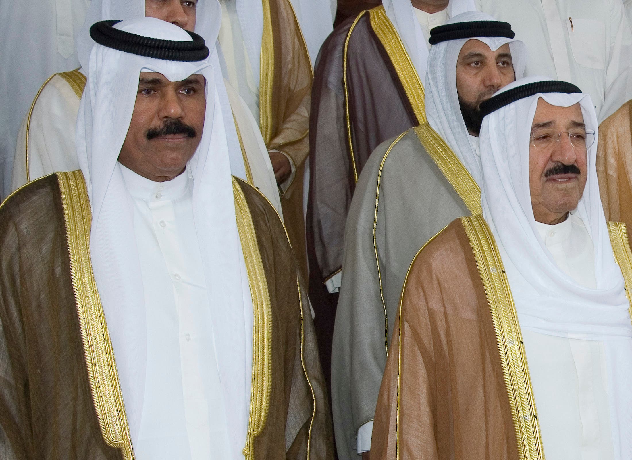 Kuwait's Emir Sheikh Sabah al-Ahmad Al-Sabah (R), Crown Prince Sheikh Nawaf al-Ahmad Al-Sabah (L) stand on the steps of the Parliament building October 30, 2006. (Reuters)