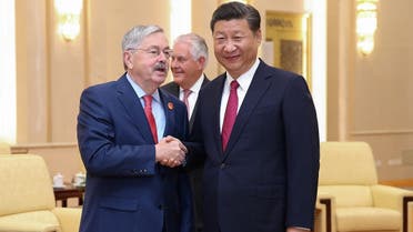 2US Ambassador Terry Edward Branstad (L) shakes hands with Chinese President Xi Jinping (R) at the Great Hall of the People on September 30, 2017 in Beijing, China. (Reuters)017-09-30T105449Z_1935685502_RC12BDFA21A0_RTRMADP_3_CHINA-USA