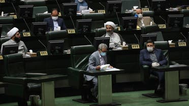 Lawmakers attend a session of the parliament in Tehran, Iran, Thursday, May 28, 2020. (AP)
