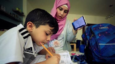 A boy studies online from home as schools close to prevent the spread of the coronavirus disease (COVID-19) in Sidon, Lebanon, June 2, 2020. (Reuters)