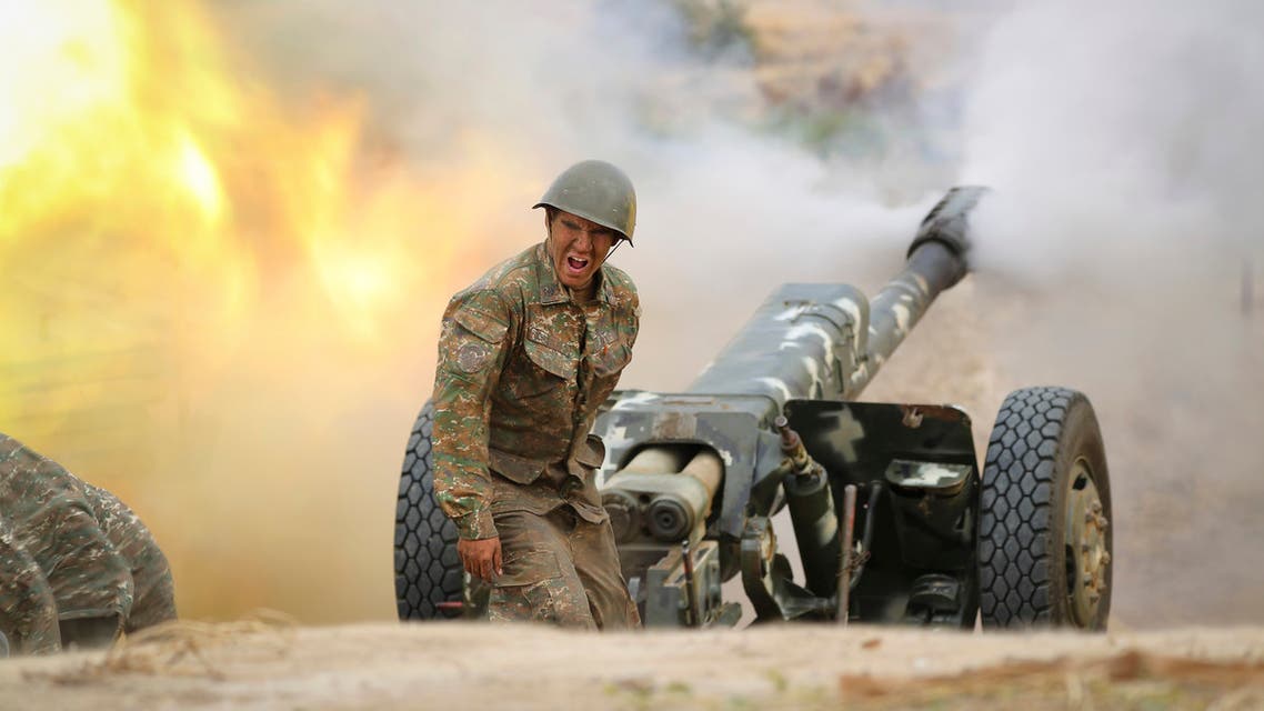 An Armenian serviceman fires a cannon towards Azerbaijan positions in the self-proclaimed Republic of Nagorno-Karabakh, Azerbaijan, Sept. 29, 2020. (AP)
