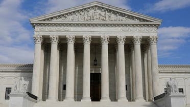 Children ride scooters across the plaza at the United States Supreme Court, in Washington, DC, March 17, 2020. (Reuters)