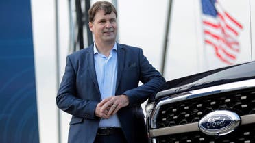 Ford Motor Co. CEO Jim Farley poses next to a new 2021 Ford F-150 pickup truck at the Rouge Complex in Dearborn, Michigan, US. (Reuters)