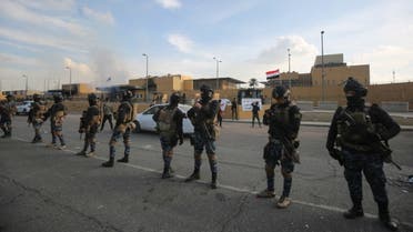Iraqi security forces are deployed in front of the US embassy in the capital Baghdad on January 1, 2020. (AFP)