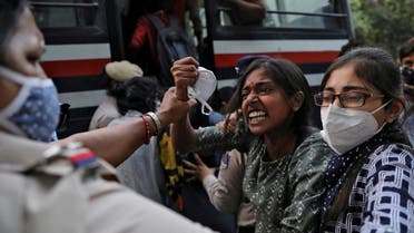 Demonstrators are detained by police during a protest after the death of a rape victim, at Delhi University, in New Delhi, India, October 1, 2020. (Reuters)