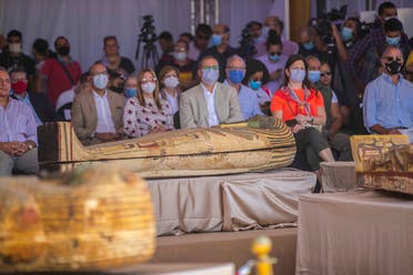 A picture taken on October 3, 2020 shows members of diplomatic missions in Egypt attending a press conference to reveal the new discovery at the Saqqara necropolis, 30 km south of the Egyptian capital Cairo. (AFP)