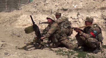 An image grab taken from a video made available by the Azeri Defense Ministry on September 28, 2020, allegedly shows Azeri troops during clashes in the region of Nagorno-Karabakh. (AFP)