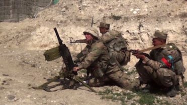 An image grab taken from a video made available on the official web site of the Azerbaijani Defence Ministry on September 28, 2020, allegedly shows Azeri troops conducting a combat operation during clashes between Armenian separatists and Azerbaijan in the breakaway region of Nagorno-Karabakh. (AFP)
