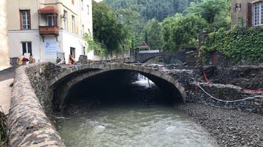 A photo taken on September 20, 2020 shows a bridge damaged in Valleraugue, southern France, a day after torrential rains swept southern France. (AFP)