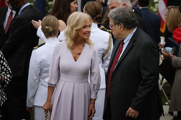 Counselor to the President Kellyanne Conway (C) and Attorney General William Barr (R). (AFP)